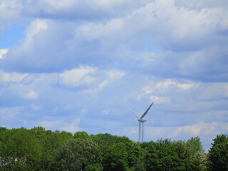 wind turbine on a green field