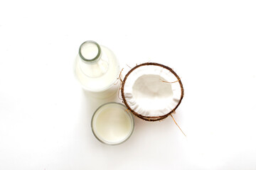 coconut products on a white background isolate, lactose-free milk, fresh and canned, natural, organic coconut products, raw materials for industry