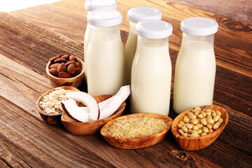 Various vegan plant based milk alternatives and ingredients. Dairy free milk substitute drink, healthy eating and drinking