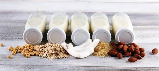 Various vegan plant based milk alternatives and ingredients. Dairy free milk substitute drink,...