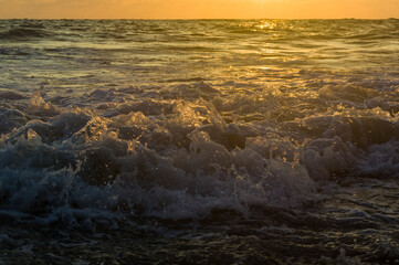 Amazing sea sunset, the sun, waves, clouds
