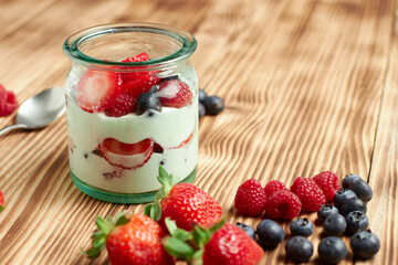 Yoghurt with fruits of the forest, healthy food concept