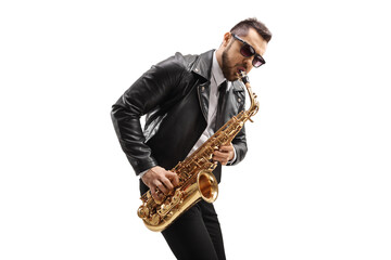 Male musician in a leather jacket wearing sunglasses and playing a saxophone