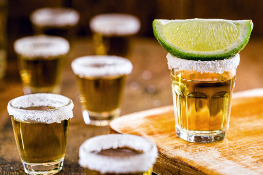 tequila, fiery drink, strong alcohol content. Image of bar and restaurant, for menu. International tequila day.