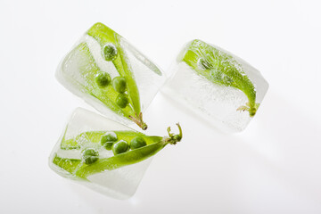 Pea pods frozen in ice cubes