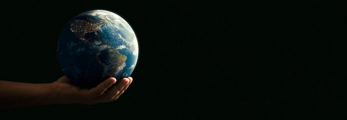 Panoramic - man with the world with his hands on black background - elements of this image furnished by NASA