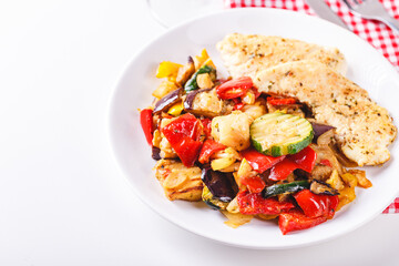 Grilled vegetables and fried chicken breast