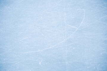 blue texture of ice skates tracks on the rink