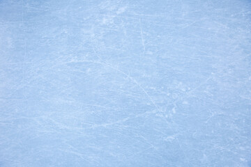 blue texture of ice skates tracks on the rink