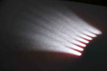 light ray on black paper background