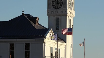 Slow motion American flag flying in the wind in Battery park in New York City