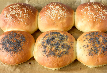 hot homemade buns with sesame and poppy seeds