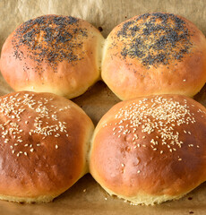 hot homemade buns with sesame and poppy seeds