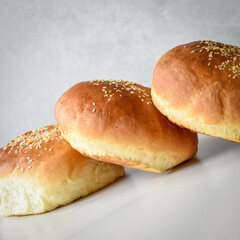 hot homemade buns with sesame and poppy seeds