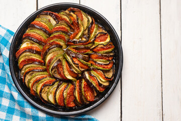 French baked ratatouille on white background
