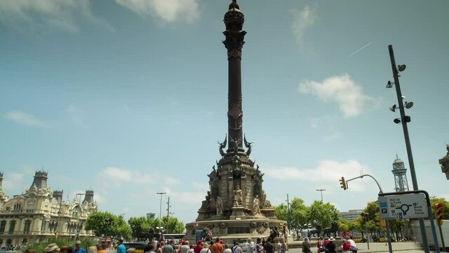 Tilting up time lapse video of people at the Colombus statue, Barcelona, Spain