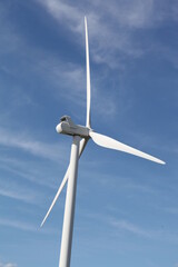 wind turbine against blue sky