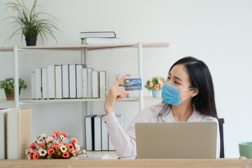 A woman is shopping online.