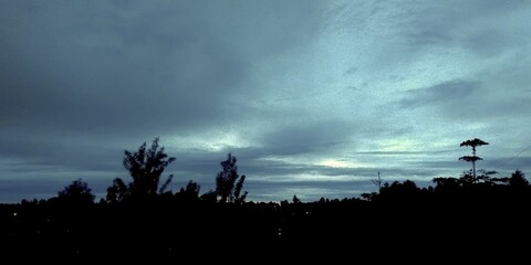 sunrise with grey sky.