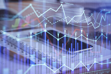 Double exposure of forex chart drawing and cell phone background. Concept of financial data analysis