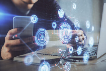 Multi exposure of man's hands holding and using a digital device and data theme drawing. Innovation concept.