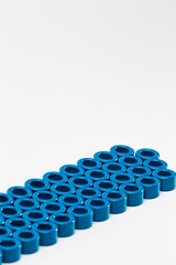 Fototapeta premium Electronic Components Concepts. Closeup of Variety of Ferrite Magnetic Cores of Blue Color. Isolated On White.