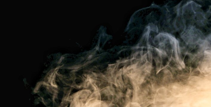 smoke on black background with light yellow