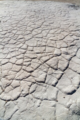 Cracked earth, sand and limestone, Australia