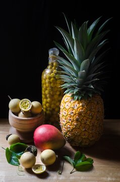 Composition of a variety of tropical fruits on a black background