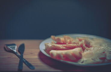 Pineapple with slices on white background