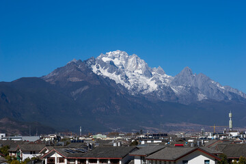 Yulong Mountain under clear sky