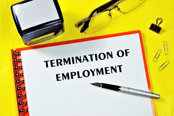 Dismissal from work-text inscription on the form in the employee's folder. On the office Desk is a...