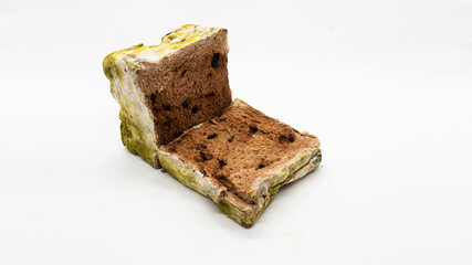 Moldy sliced bread, isolated on white background