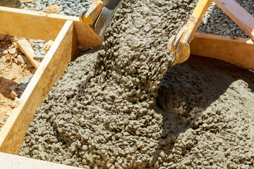 Construction process making of freshly poured cement sidewalk