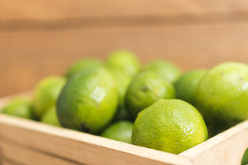 fresh limes in a box