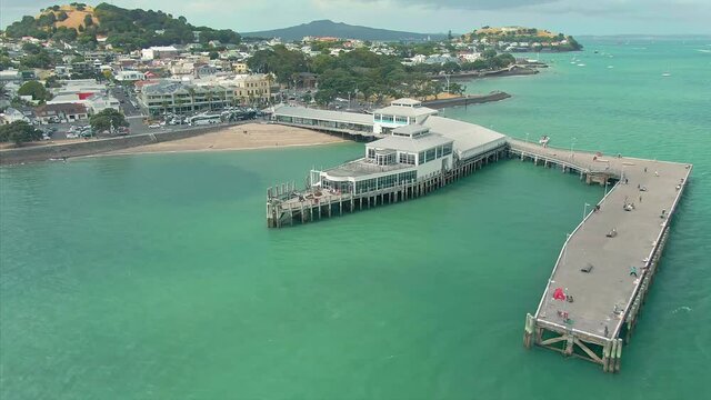 Aerial: Devonport Wharf, town center & Waitemata Harbour, Auckland, New Zealand