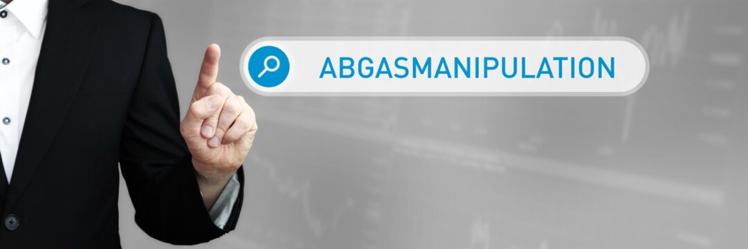 Abgasmanipulation. Mann zeigt mit Finger auf Suchfeld im Internet. Blaues Wort steht in der Suche. Konzept f&uuml;r Business, Finanzen, Statistik