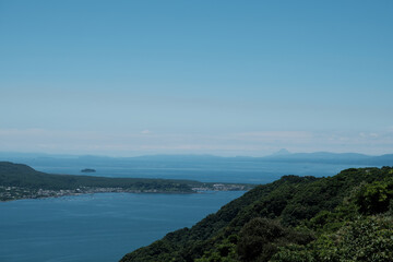 Fototapeta na wymiar 桜島の足先に見える開聞岳