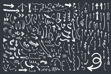 Hand drawn vector doodle arrows set on a blackboard