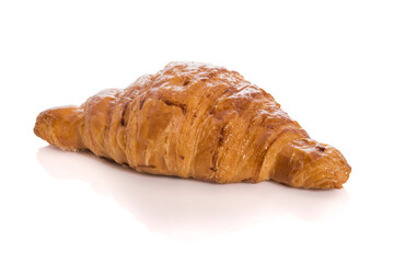 Homemade croissant isolated on white background with reflection.