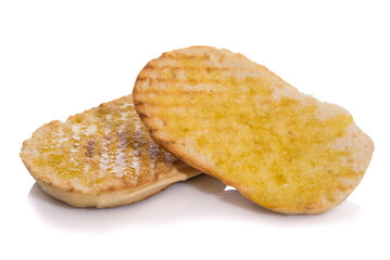 Toasted mollete with olive oil, typical Andalusian breakfast isolated on white background.