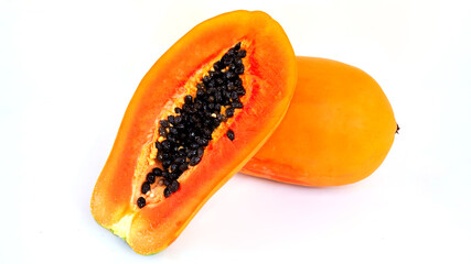 Papaya in half cut and and whole papaya in white background. topical fruit.