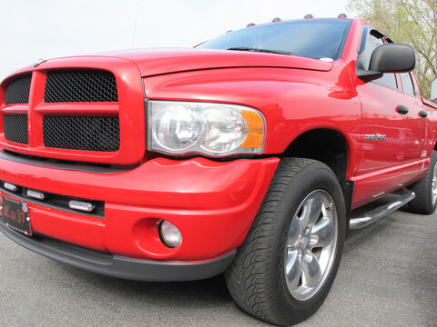 Dodge Ram 1500 Pickup car in front detail view of red truck