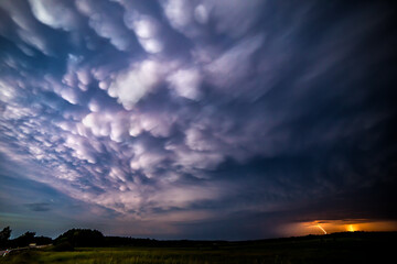 Late evening mammatus clouds with lightning
