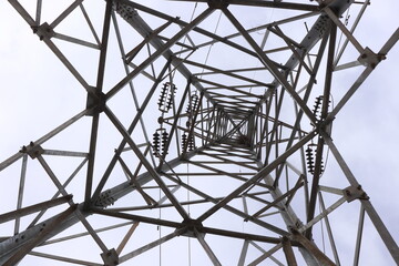 A utility pole is a column or post used to support overhead power lines and various other public utilities, such as electrical cable, fiber optic cable, and related equipment such as transformers .