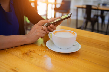 concept businesswoman hands searching for data on Notebook with analyzing charts at his workplace.