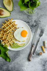 Fresh delicious and nutritious breakfast with waffles with spinach