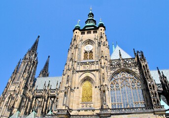 Fototapeta premium Old gothic architecture house historical landmark Prague Czech republic city Europe tour blue sky windows background