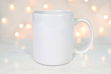 11 ounce Coffee Mug Mockup with white bokeh lights