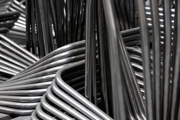 Fotobehang Office Furniture Industry. Metal parts of chairs.  Steel frames. Pipes © A